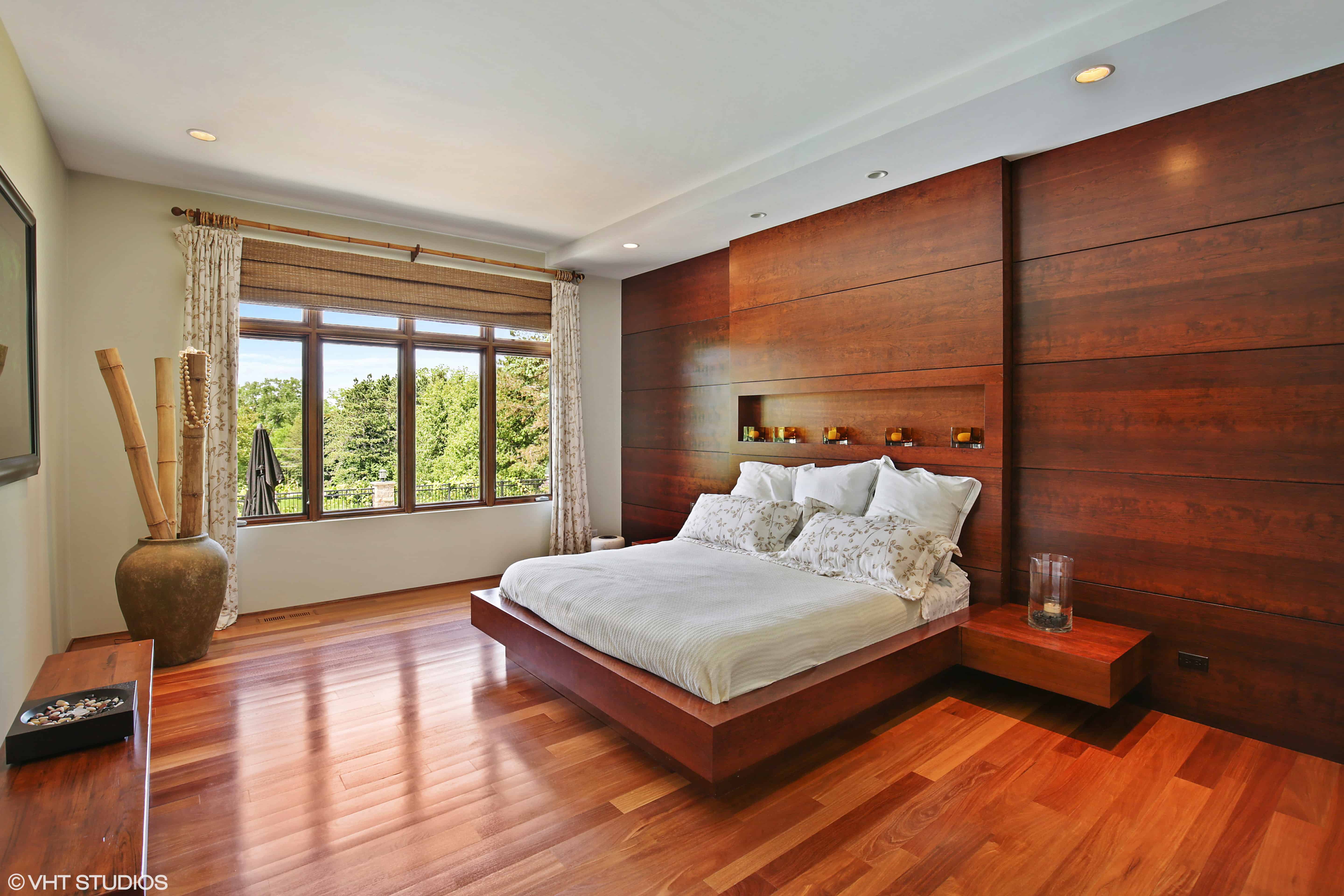 bedroom with natural light and wood