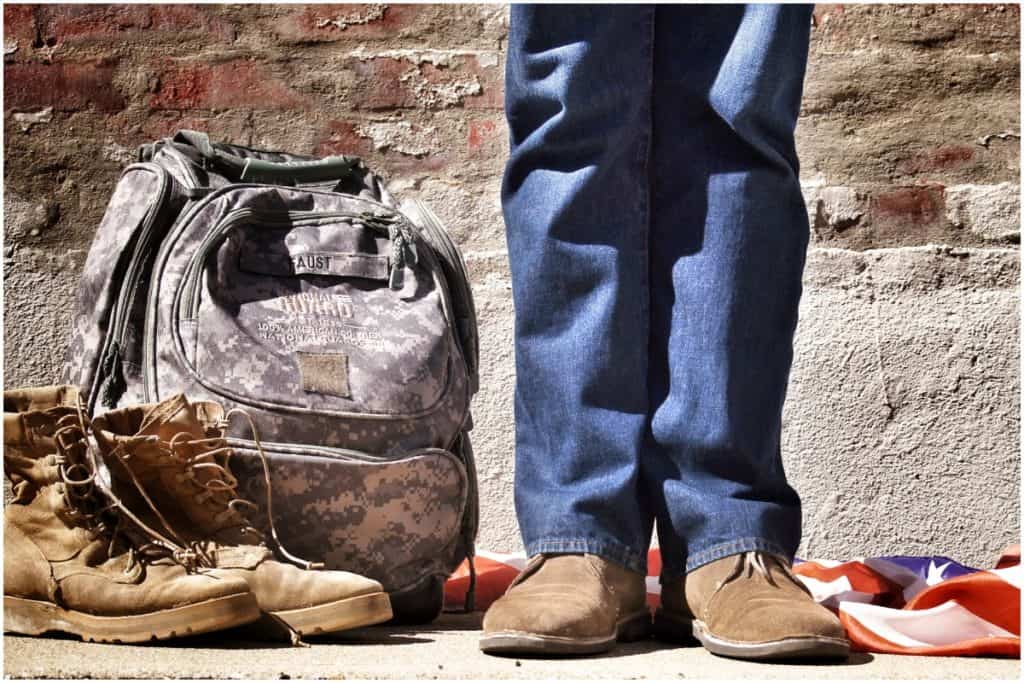 american soldier boots and backpack