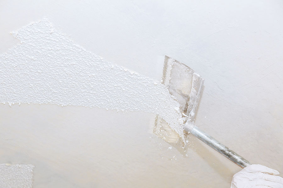 Have your popcorn ceiling removed by a professional.