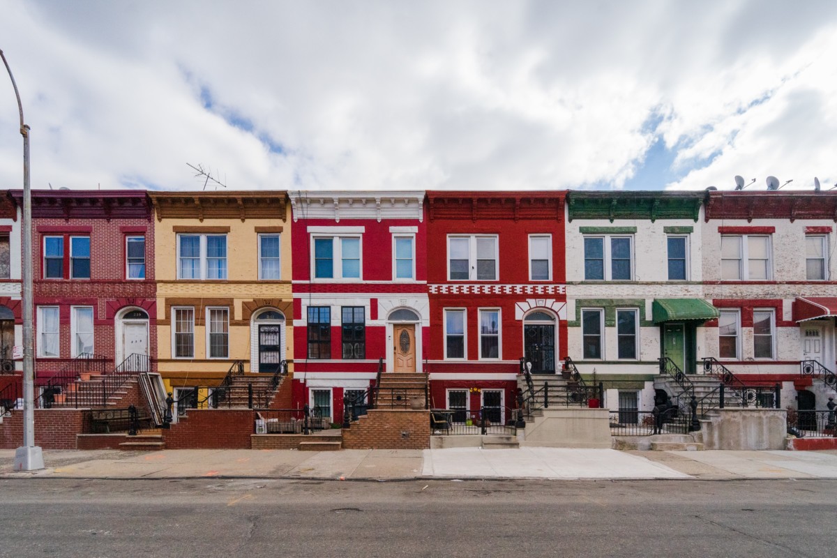 red and yellow italianate row houses in new york