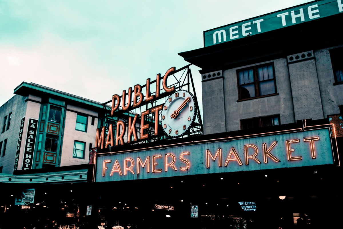 pike place market with cloudy skies in the city of seattle