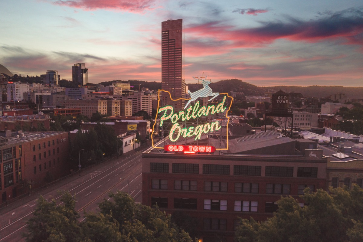 The Portland, OR sign at sunset