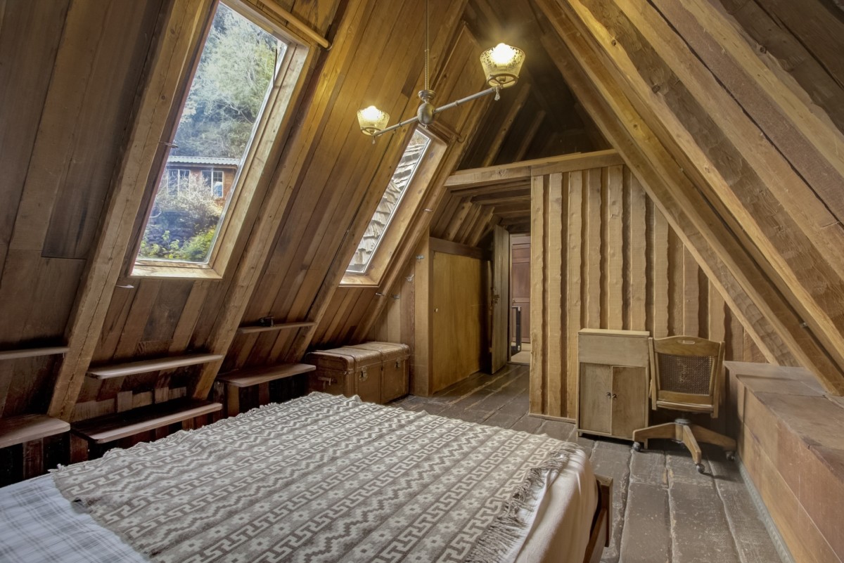 attic space with wood beams
