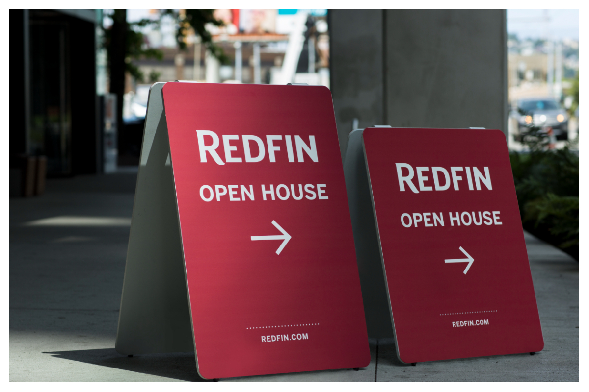 Two Redfin open house signs next to each other