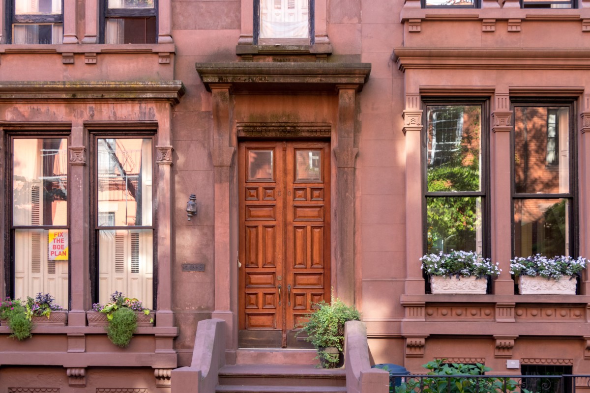 brownstone house exterior with stoop 