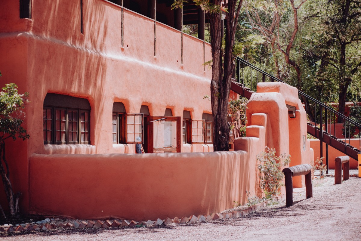 pink adobe walls on the exterior of a house in new mexico