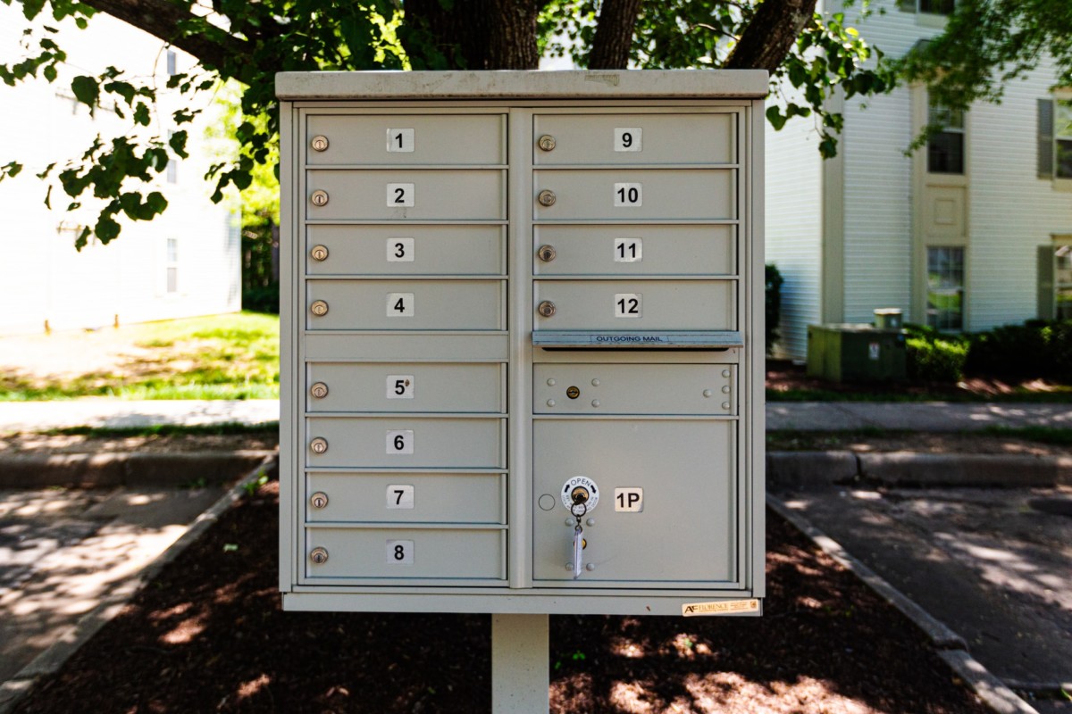 outdoor apartment mailbox with address labels