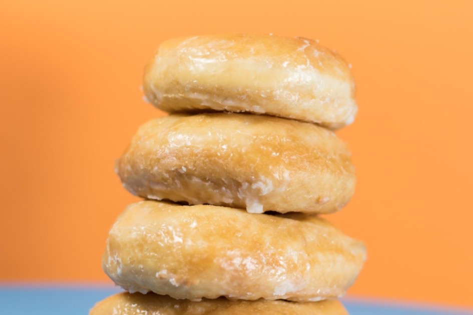 Glazed doughnuts stacked on top of one another