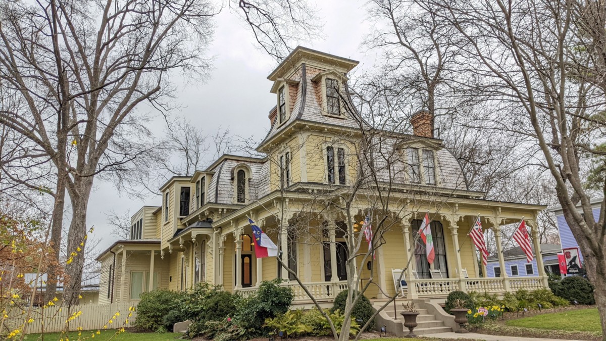 a historic looking home in a neighborhood in raleigh