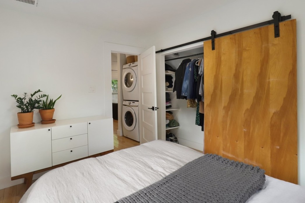 rented bedroom with closet and washer dryer access