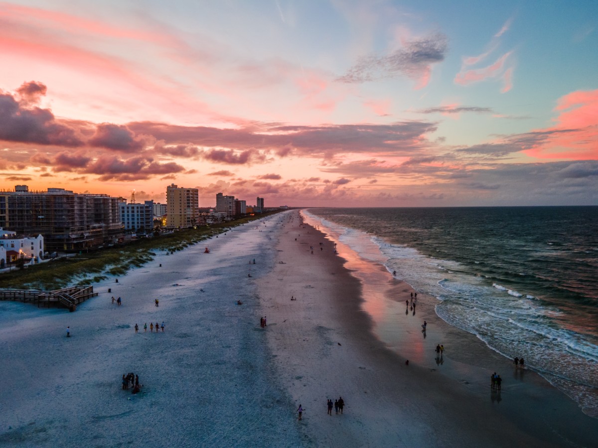 view of beach at sunset from affordable jacksonville suburbs