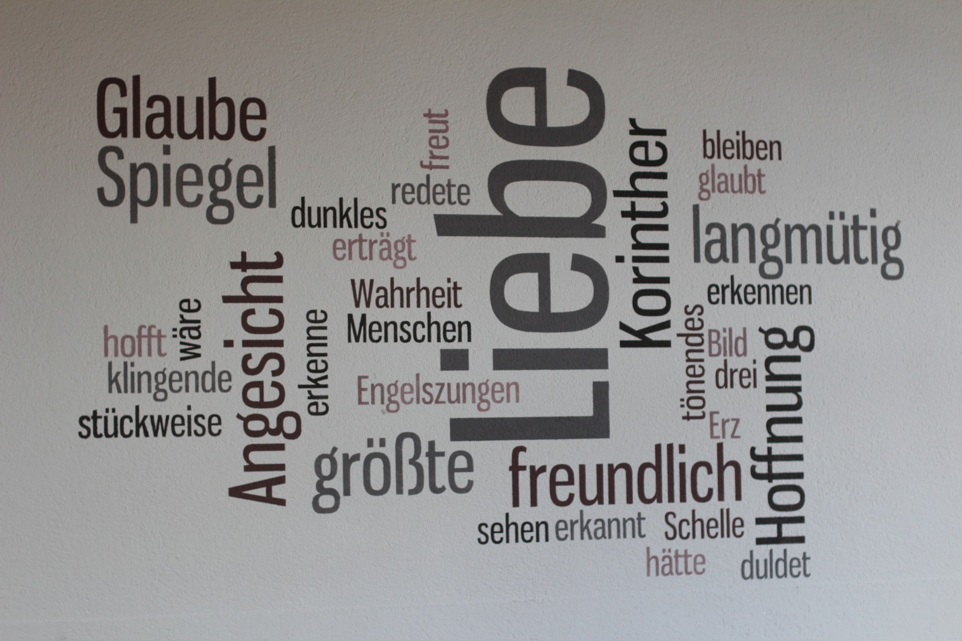 Vinyl wall stickers translating "love", "believe", "faith" in multiple languages