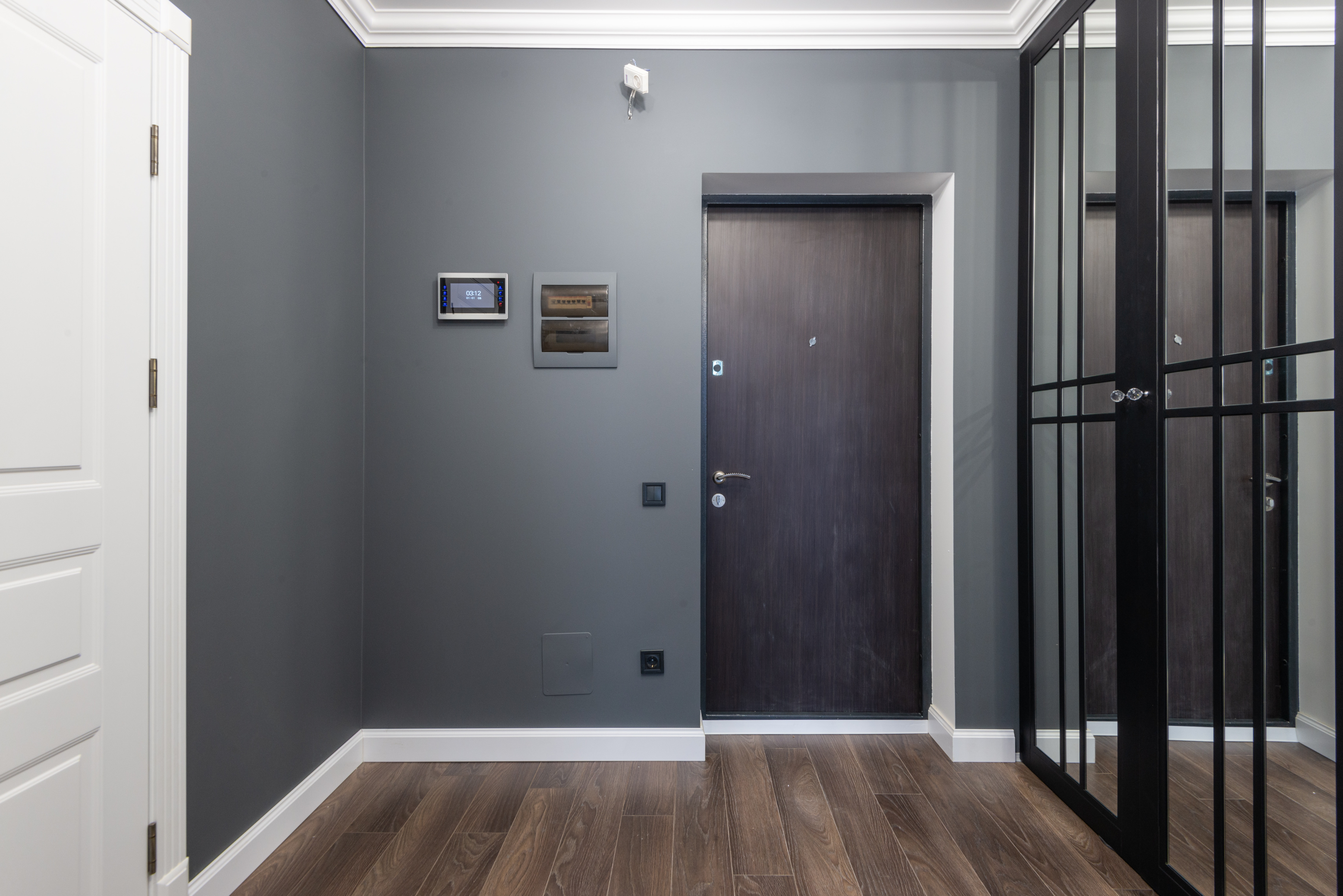 A modern apartment with a keyless access control system for entries and exits