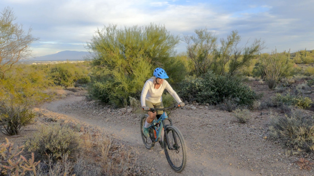 woman mountain biking in tucson arizona