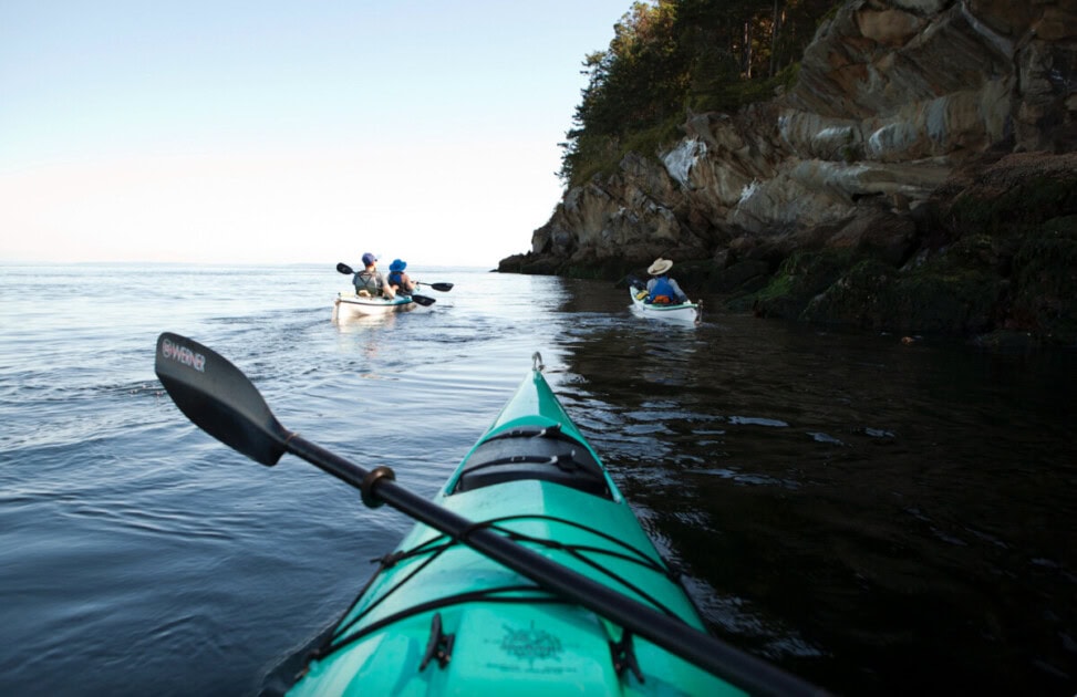 Photo from the perspective on someone kayaking, an activity on the ultimate Bellingham bucket list